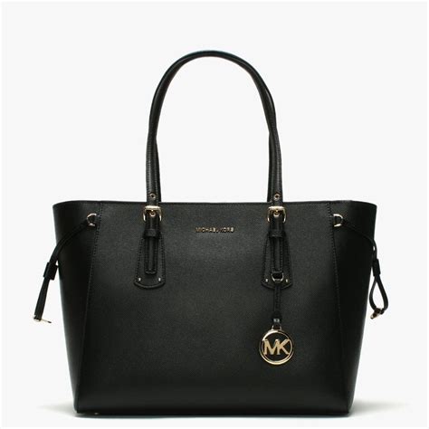 make up tas michael kors|Michael Kors leather tote.